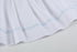 white-and-blue-holy-smocked-bishop-dress-lil-cactus-sophias-style-6