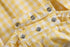 yellow-gingham-lemon-smocked-flutter-bubble-romper-lil-cactus-sophias-style-7