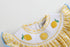 yellow-gingham-lemon-smocked-flutter-bubble-romper-lil-cactus-sophias-style-8
