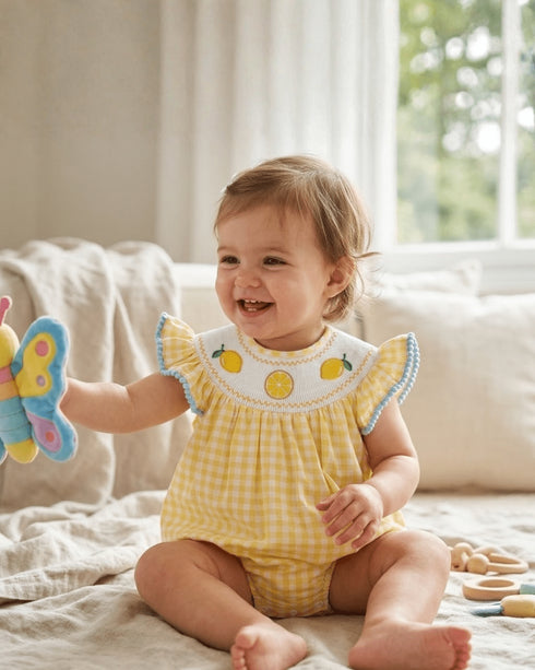 yellow-gingham-lemon-smocked-flutter-bubble-romper-lil-cactus-sophias-style-2